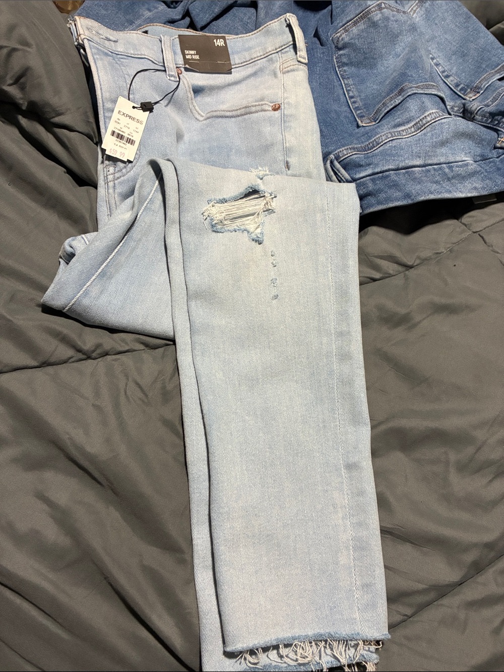 Express Light Blue Distressed Ankle Jeans